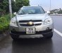 Chevrolet Captiva 2.4 LT 2008 - Bán xe Chevrolet Captiva 2.4 LT đời 2008, màu bạc còn mới