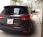 Kia Rondo GAT 2015 - Bán ô tô Kia Rondo GAT đời 2015, màu nâu giá cạnh tranh