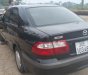 Mazda 626 2001 - Cần bán lại xe Mazda 626 năm sản xuất 2001, màu đen