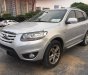 Hyundai Santa Fe SLX EVGT 2009 - Cần bán xe Hyundai Santa Fe SLX eVGt 2009, màu bạc, xe nhập còn mới, 670tr