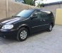 Kia Carnival GS 2005 - Bán xe Kia Carnival GS năm 2005, màu đen, giá 219tr