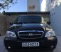 Kia Carnival GS 2005 - Bán xe Kia Carnival GS năm 2005, màu đen, giá 219tr