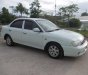 Kia Spectra MT 2004 - Cần bán gấp Kia Spectra MT năm 2004, màu trắng còn mới, giá 125tr