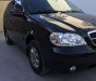 Kia Carnival GS 2005 - Bán xe Kia Carnival GS năm 2005, màu đen, giá 219tr