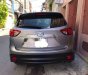 Mazda CX 5 2014 - Gia đình bán ô tô Mazda CX 5 năm 2014, màu bạc 