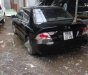 Mitsubishi Lancer 2003 - Cần bán lại xe Mitsubishi Lancer 2003, màu đen