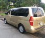 Hyundai Starex 2010 - Bán ô tô Hyundai Starex 9 chỗ đời 2010, màu vàng, xe nhập 