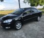 Toyota Corolla altis 1.8G MT 2006 - Bán Toyota Corolla altis 1.8G MT sản xuất năm 2006, màu đen