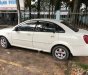 Daewoo Lacetti EX 1.6 MT 2004 - Cần bán lại xe Daewoo Lacetti EX 1.6 MT đời 2004, màu trắng