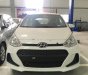Hyundai Grand i10  1.2 MT Base 2018 - Bán ô tô Hyundai Grand i10 1.2 MT Base năm sản xuất 2018, màu trắng 