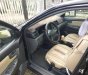 Toyota Corolla altis 2005 - Cần bán lại xe Toyota Corolla altis đời 2005, màu đen, 313tr