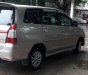 Toyota Innova 2.0E 2014 - Cần bán Toyota Innova 2.0E đời 2014, màu bạc 