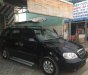 Kia Carnival 2007 - Cần bán lại xe Kia Carnival đời 2007, màu đen, 228tr