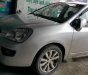 Kia Carens   2010 - Bán Kia Carens 2010 tự động, màu bạc, xe đẹp còn zin