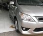 Toyota Innova 2.0E 2013 - Bán ô tô Toyota Innova 2.0E đời 2013, màu bạc xe gia đình 