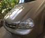 Daewoo Lacetti EX 2010 - Cần bán Daewoo Lacetti EX sản xuất 2010, màu vàng cát, với giá 269tr