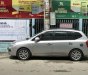 Kia Carens   2010 - Bán Kia Carens 2010 tự động, màu bạc, xe đẹp còn zin