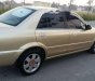 Ford Laser  1.8MT 2003 - Cần bán Ford Laser 1.8MT năm 2003, màu vàng chính chủ giá cạnh tranh