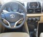 Toyota Vios 1.5E 2015 - Bán Toyota Vios 1.5E năm 2015, màu bạc số sàn