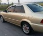 Ford Laser  1.8MT 2003 - Cần bán Ford Laser 1.8MT năm 2003, màu vàng chính chủ giá cạnh tranh