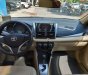 Toyota Vios 1.5E CVT 2017 - Bán Toyota Vios 1.5E CVT đời 2017, màu bạc