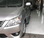 Toyota Innova 2.0E 2013 - Bán ô tô Toyota Innova 2.0E đời 2013, màu bạc xe gia đình 