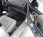 Ford Laser GHIA 1.8 MT 2003 - Cần bán lại xe Ford Laser GHIA 1.8 MT 2003, màu bạc 