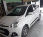 Hyundai Grand i10 1.2 MT 2016 - Cần bán gấp Hyundai Grand i10 1.2 MT đời 2016, màu trắng