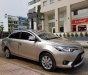 Toyota Vios 1.5E 2016 - Cần bán lại xe Toyota Vios 1.5E 2016, màu vàng số tự động giá cạnh tranh