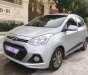 Hyundai Grand i10   1.2AT  2015 - Bán ô tô Hyundai Grand i10 1.2AT đời 2015, màu bạc, xe nhập số tự động giá cạnh tranh