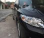 Toyota Corolla altis   2009 - Cần bán Toyota Corolla altis đời 2009, màu đen, số sàn