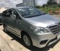 Toyota Innova E 2014 - Bán Toyota Innova E 2014, màu bạc xe gia đình giá cạnh tranh