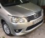 Toyota Innova MT 2013 - Cần bán gấp Toyota Innova MT sản xuất năm 2013, màu bạc, sơn rin trên 90%, vỏ mới thay