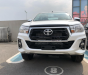 Toyota Hilux 2.4 E 4x2 AT 2018 - Cần bán Toyota Hilux sản xuất 2018 màu trắng, giá 695 triệu, xe nhập