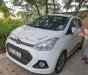 Hyundai Grand i10 2014 - Cần bán Hyundai Grand i10 đời 2014, màu trắng số tự động