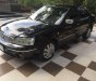 Ford Laser 1.8AT 2003 - Cần bán gấp Ford Laser 1.8AT năm sản xuất 2003, màu đen chính chủ