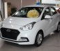 Hyundai Grand i10 1.2 AT  2018 - Bán Hyundai I10 1.2 AT Sedan màu trắng xe có sẵn giao ngay, hỗ trợ vay trả góp lãi suất ưu đãi, LH 0903 175 312