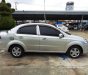 Daewoo Gentra 2011 - Cần bán gấp Daewoo Gentra đời 2011, màu bạc xe gia đình, giá 245tr