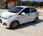 Hyundai Grand i10 2014 - Chính chủ bán Hyundai Grand i10 đời 2014, màu bạc