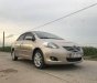 Toyota Vios E 2011 - Cần bán Toyota Vios E sản xuất năm 2011, màu vàng