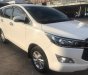 Toyota Innova 2.0E 2017 - Cần bán Toyota Innova E đăng ký 6/2017 số sàn, màu trắng
