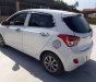 Hyundai Grand i10 2014 - Chính chủ bán Hyundai Grand i10 đời 2014, màu bạc