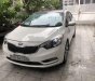 Kia K3   2.0  2014 - Cần bán gấp Kia K3 2.0 sản xuất 2014, màu trắng, giá chỉ 520 triệu