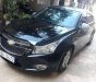 Chevrolet Cruze   MT 2010 - Cần bán xe Chevrolet Cruze MT sản xuất năm 2010, màu đen xe gia đình