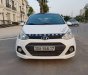 Hyundai Grand i10   2016 - Cần bán Hyundai Grand i10 năm sản xuất 2016, màu trắng, xe nhập chính chủ