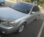 Ford Laser LXi 1.6 MT 2004 - Cần bán gấp Ford Laser LXi 1.6 MT 2004, màu bạc như mới