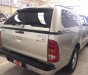 Toyota Hilux 2.5E 2011 - Cần bán lại xe Toyota Hilux 2.5E năm 2011, màu bạc số sàn 