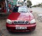 Daewoo Lanos SX 2003 - Bán xe Daewoo Lanos SX năm sản xuất 2003, màu đỏ, xe gia đình