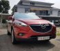 Mazda CX 9 2014 - Cần bán gấp Mazda CX 9 sản xuất 2014, màu đỏ xe gia đình