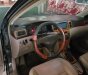 Toyota Corolla J 1.3 MT 2003 - Cần bán Toyota Corolla J 1.3 MT đời 2003, màu đen số sàn